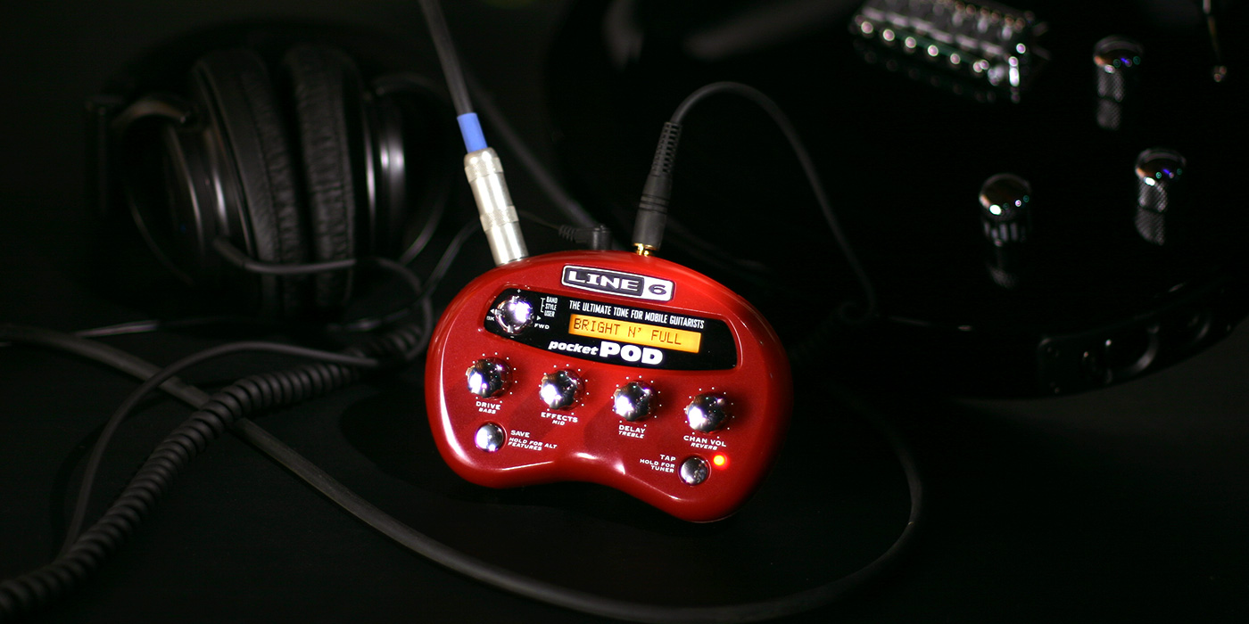 Line 6 Pocket POD product image being used with a Variax and headphones